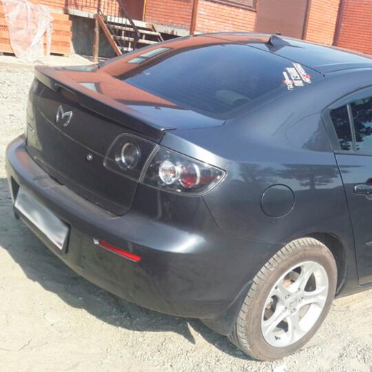 Orticar Спойлер [Лип] на Mazda 3 (BK) I '03-09 седан (под покраску)