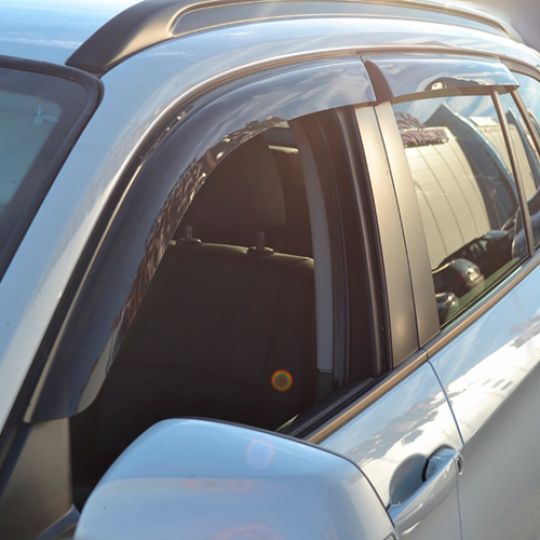 COBRA TUNING Дефлекторы окон на BMW X1 (E84) '09-15 (накладные)