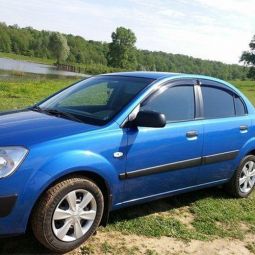 COBRA TUNING Дефлекторы окон на Kia Rio II '05-11 седан (накладные)