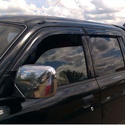 COBRA TUNING Дефлекторы окон на Mitsubishi L200 III '96-06 (накладные)