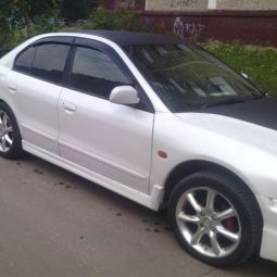 COBRA TUNING Дефлекторы окон на Mitsubishi Galant VIII '96-03 седан (накладные)