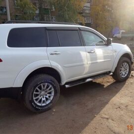 COBRA TUNING Дефлекторы окон на Mitsubishi Pajero Sport II '08- (накладные)