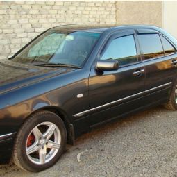 COBRA TUNING Дефлекторы окон на Mercedes-Benz E-Class (W210) '95-02 седан (накладные)