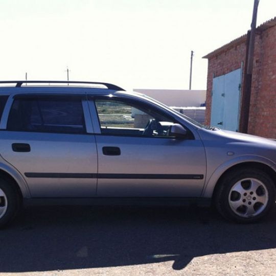 COBRA TUNING Дефлекторы окон на Opel Astra G '98-04 универсал (накладные)