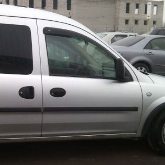 COBRA TUNING Дефлекторы окон на Opel Combo C '01-11 2d (накладные) COBRA TUNING Дефлекторы окон на Opel Combo C '01-11 2d (накладные)