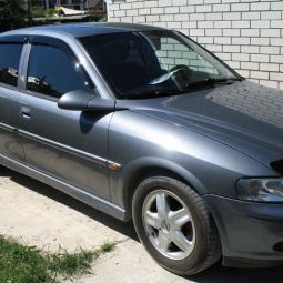 COBRA TUNING Дефлекторы окон на Opel Vectra B '95-02 седан (накладные)