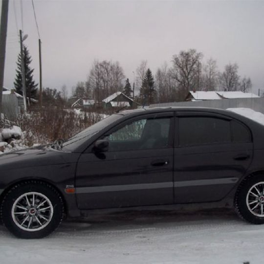 COBRA TUNING Дефлекторы окон на Toyota Avensis (T22) '98-03 седан (накладные)