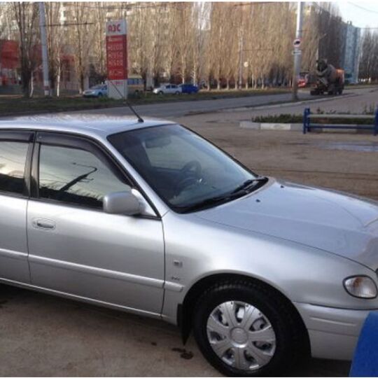 COBRA TUNING Дефлекторы окон на Toyota Corolla (E11) '97-02 хэтчбек 5d (накладные)