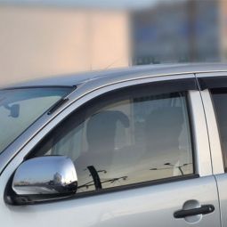 COBRA TUNING Дефлекторы окон на Toyota Hilux VII '11- (накладные)