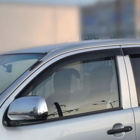 COBRA TUNING Дефлекторы окон на Toyota Hilux VII '11- (накладные)