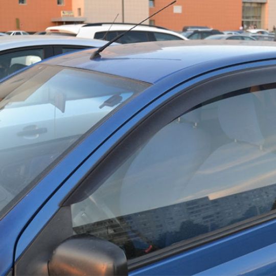 COBRA TUNING Дефлекторы окон на Toyota Yaris/Vitz I '99-06 3d (накладные)