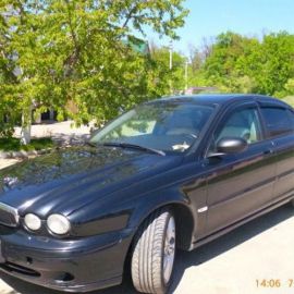 COBRA TUNING Дефлекторы окон на Jaguar X-Type (X400) '01-09 седан (накладные)