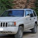 COBRA TUNING Дефлекторы окон на Jeep Grand Cherokee (ZJ) '93-98 (накладные)