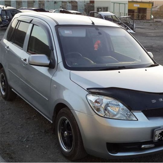 COBRA TUNING Дефлекторы окон на Mazda 2 (DY) '02-07 (накладные)