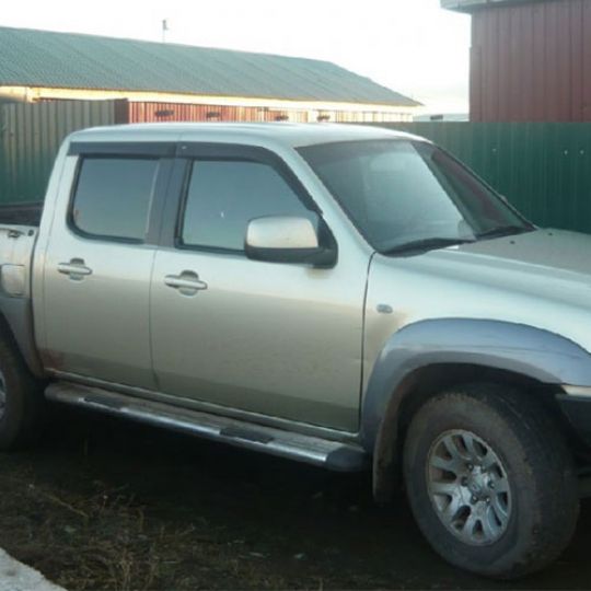 COBRA TUNING Дефлекторы окон на Mazda BT-50 I '06- (накладные) COBRA TUNING Дефлекторы окон на Mazda BT-50 I '06- (накладные)