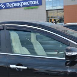 COBRA TUNING Дефлекторы окон на Mazda CX-7 '06-12 (накладные)