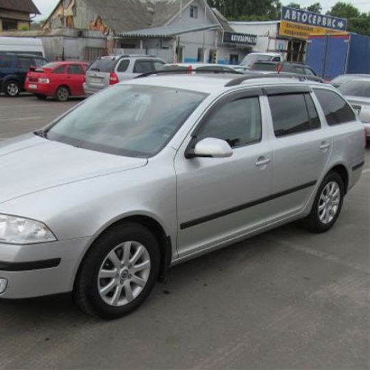 COBRA TUNING Дефлекторы окон на Skoda Octavia II '04-10 универсал (накладные)