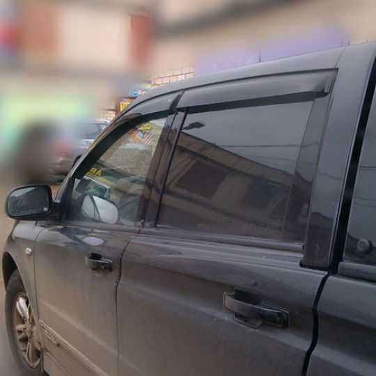 COBRA TUNING Дефлекторы окон на SsangYong Actyon Sports '06-12 (накладные)