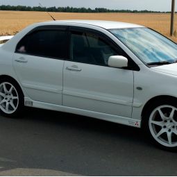 VL-Tuning Дефлекторы окон на Mitsubishi Lancer IX '03-09 седан (накладные)