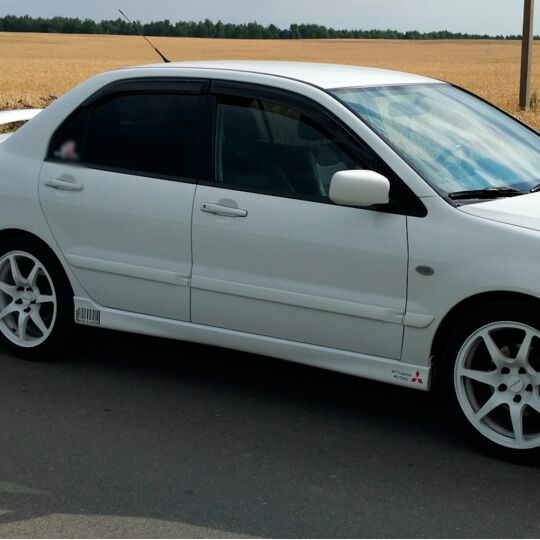 VL-Tuning Дефлекторы окон на Mitsubishi Lancer IX '03-09 седан (накладные)