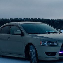 VL-Tuning Дефлекторы окон на Mitsubishi Lancer X '07- хэтчбек (накладные)