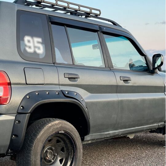 VL-Tuning Дефлекторы окон на Mitsubishi Pajero Pinin '98-07 5d (накладные)