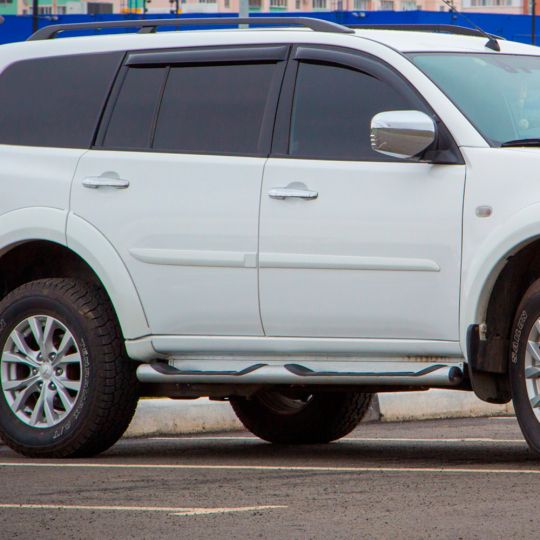 VL-Tuning Дефлекторы окон на Mitsubishi Pajero Sport II '08- (накладные)